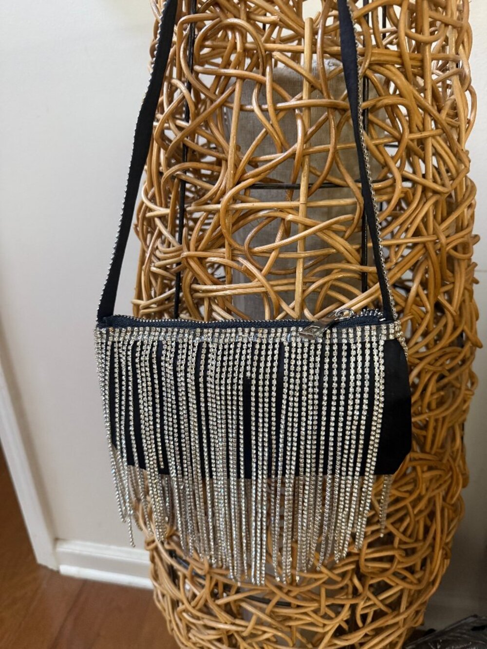 Black cocktail hand bag with rhinestone fringe and strap